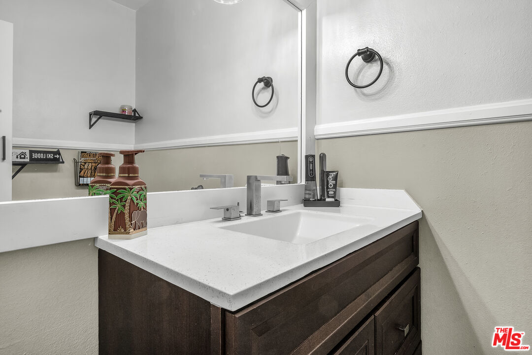 5460 White Oak Avenue, Unit D309 Encino, CA 91316 - Photo 10 of 22 a kitchen with a sink a stove and cabinets