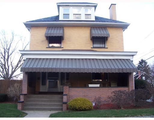 475 New York Avenue Rochester, PA 15074 - Photo 1 of 18 Exterior Front. Truly one of the most solid, charming & spacious 3-story homes around...Boasts a 2-plus stall garage w/11 clngs & deck above! Charming front porch offers a great place for whiling away the summer hours & great for storm-watching!