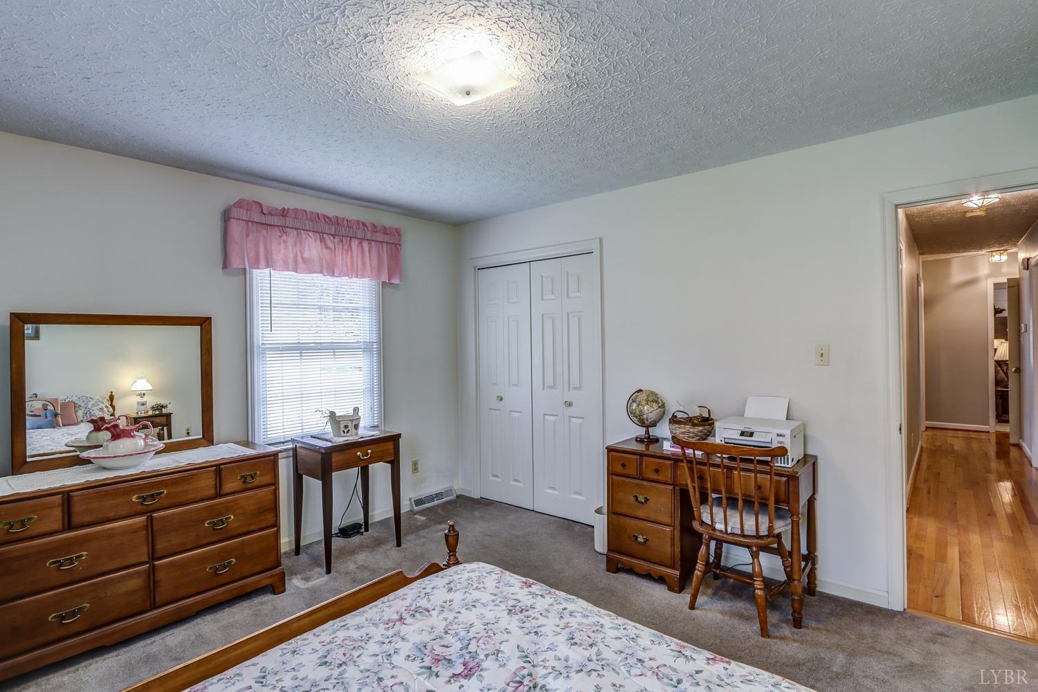 759 Farfields Drive Lynchburg, VA 24502 - Photo 30 of 53 a bed room with a bed and a dresser