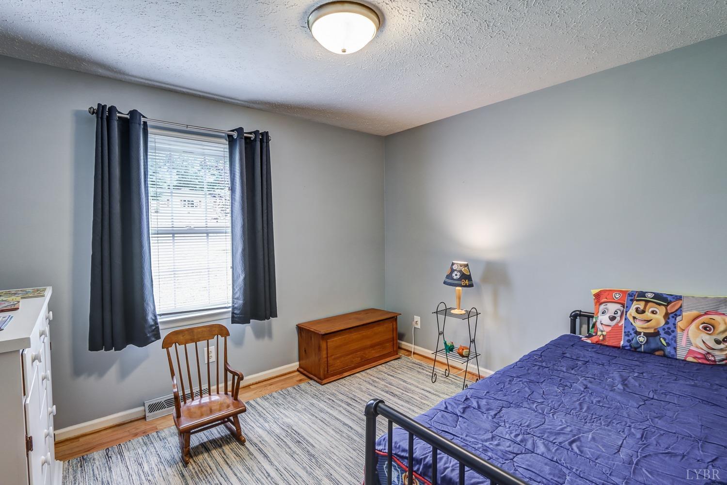 759 Farfields Drive Lynchburg, VA 24502 - Photo 31 of 53 a living room with furniture and a window