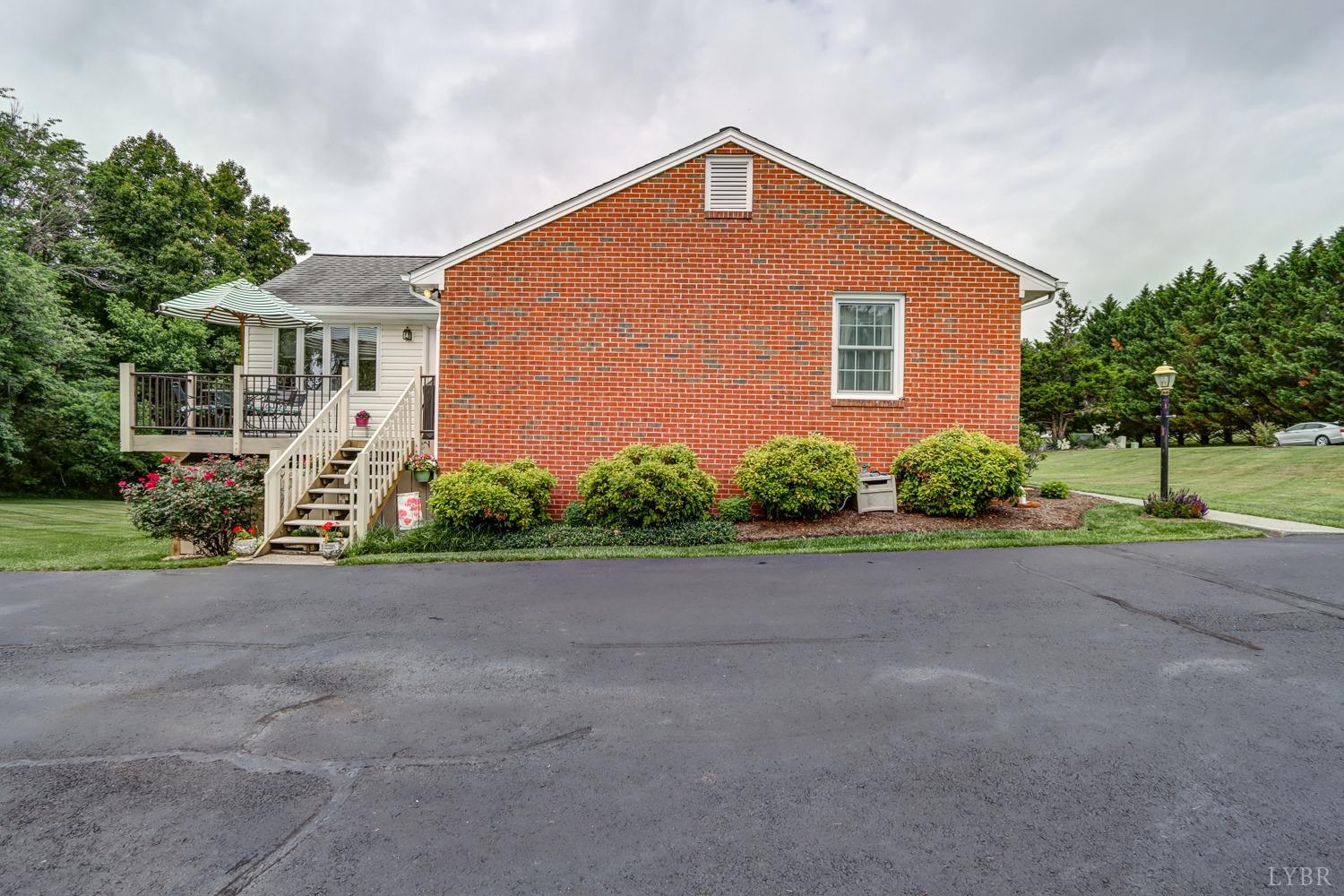 759 Farfields Drive Lynchburg, VA 24502 - Photo 42 of 53 a front view of a house with a yard and a garage