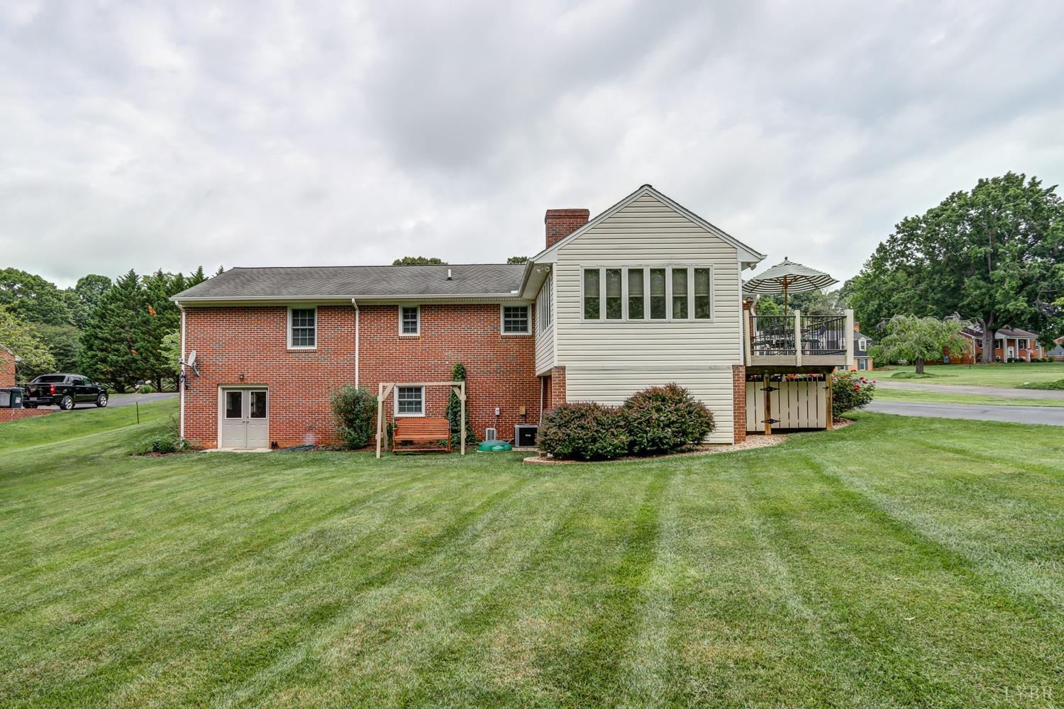 759 Farfields Drive Lynchburg, VA 24502 - Photo 47 of 53 a front view of a house with a yard and garage