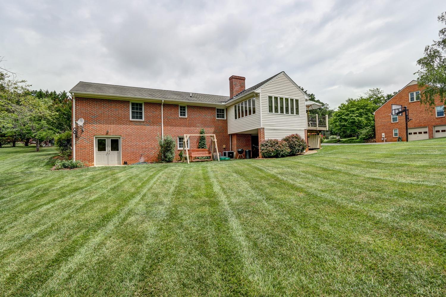 759 Farfields Drive Lynchburg, VA 24502 - Photo 48 of 53 a front view of a house with a yard and garage