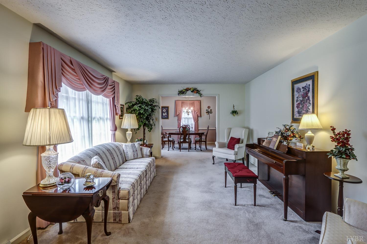 759 Farfields Drive Lynchburg, VA 24502 - Photo 6 of 53 a living room with furniture and a lamp
