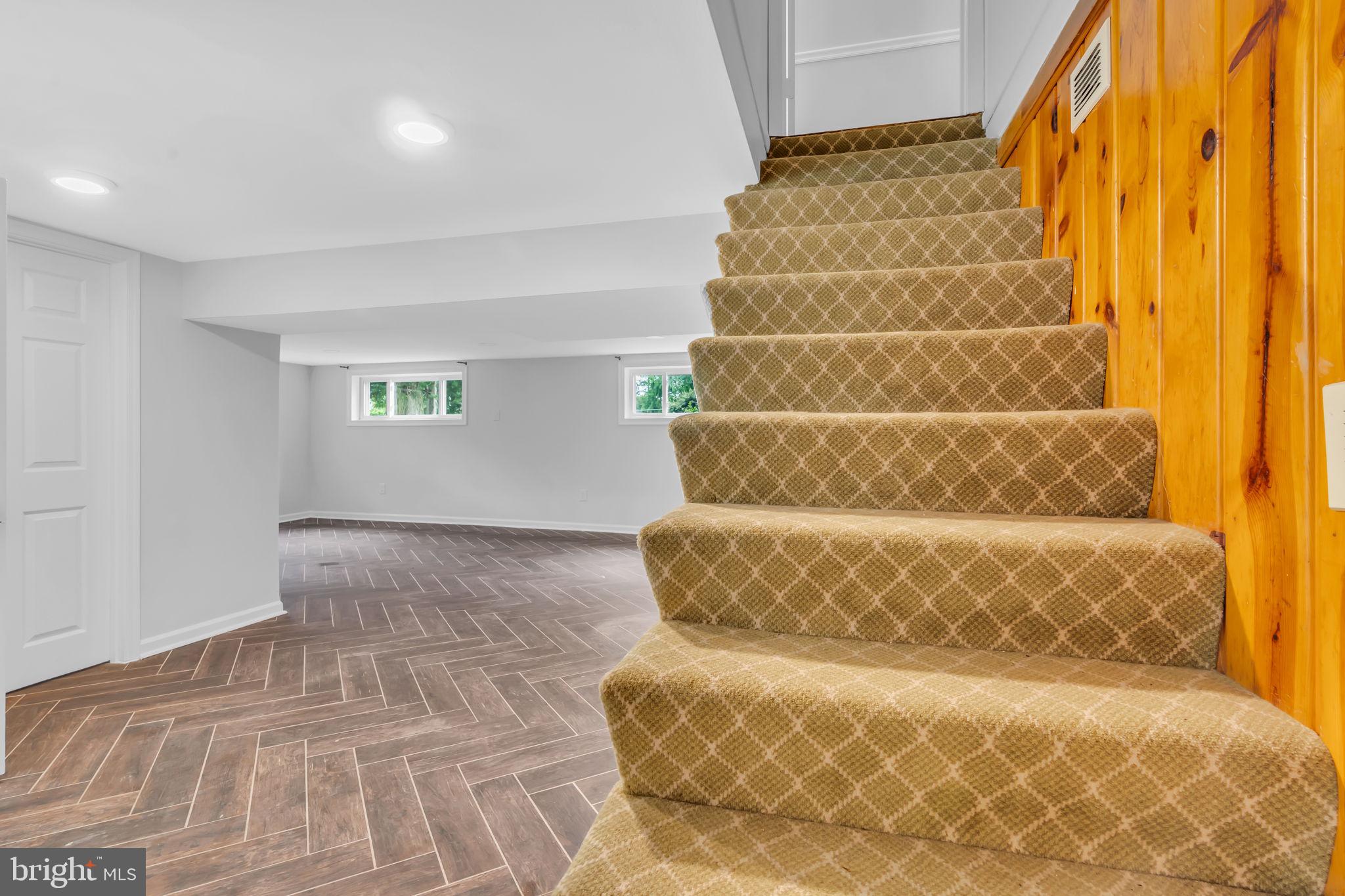 6809 Braddock Road Springfield, VA 22151 - Photo 32 of 60 a view of walk in closet with empty racks