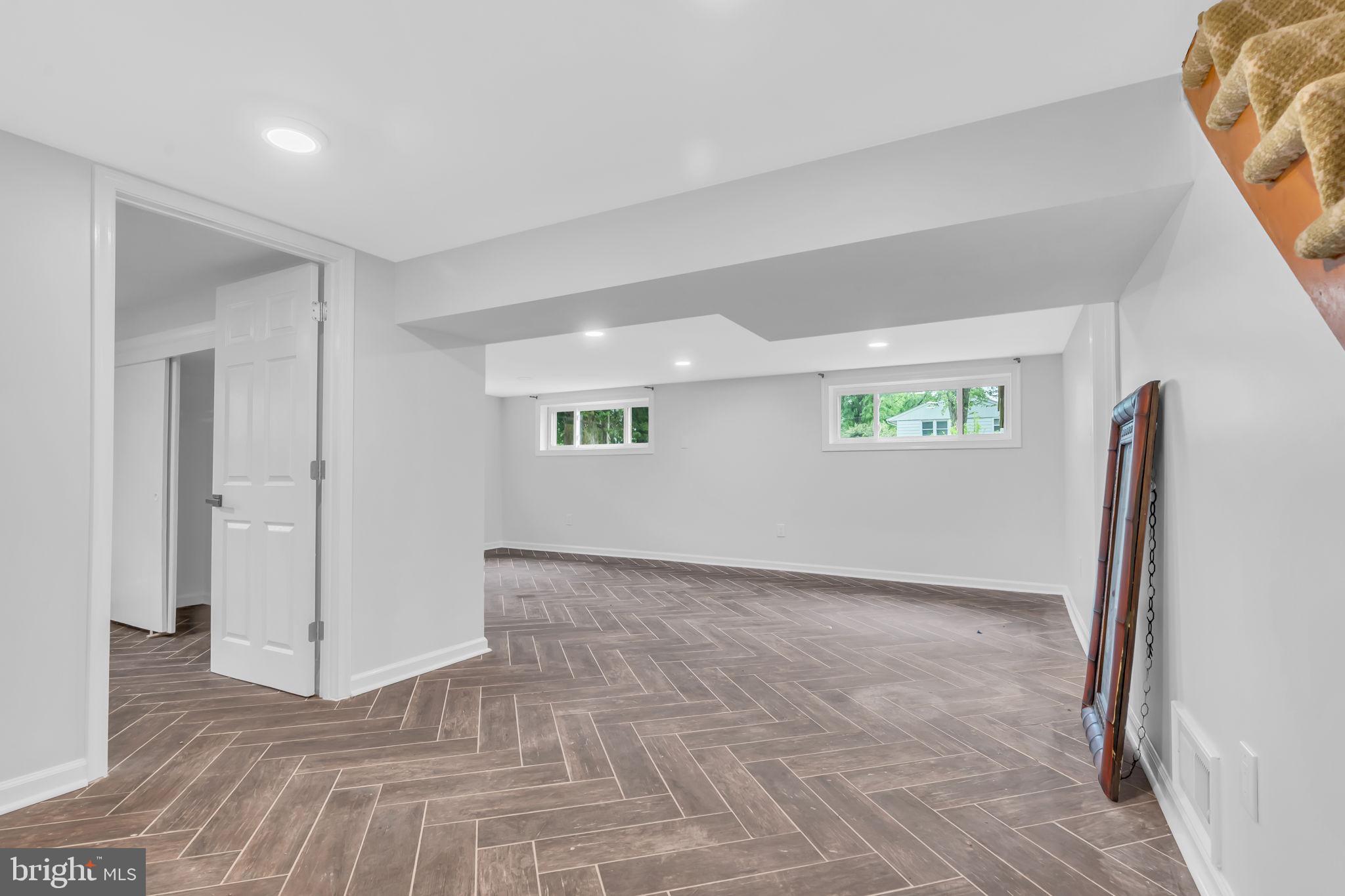 6809 Braddock Road Springfield, VA 22151 - Photo 36 of 60 a view of an empty room and a window