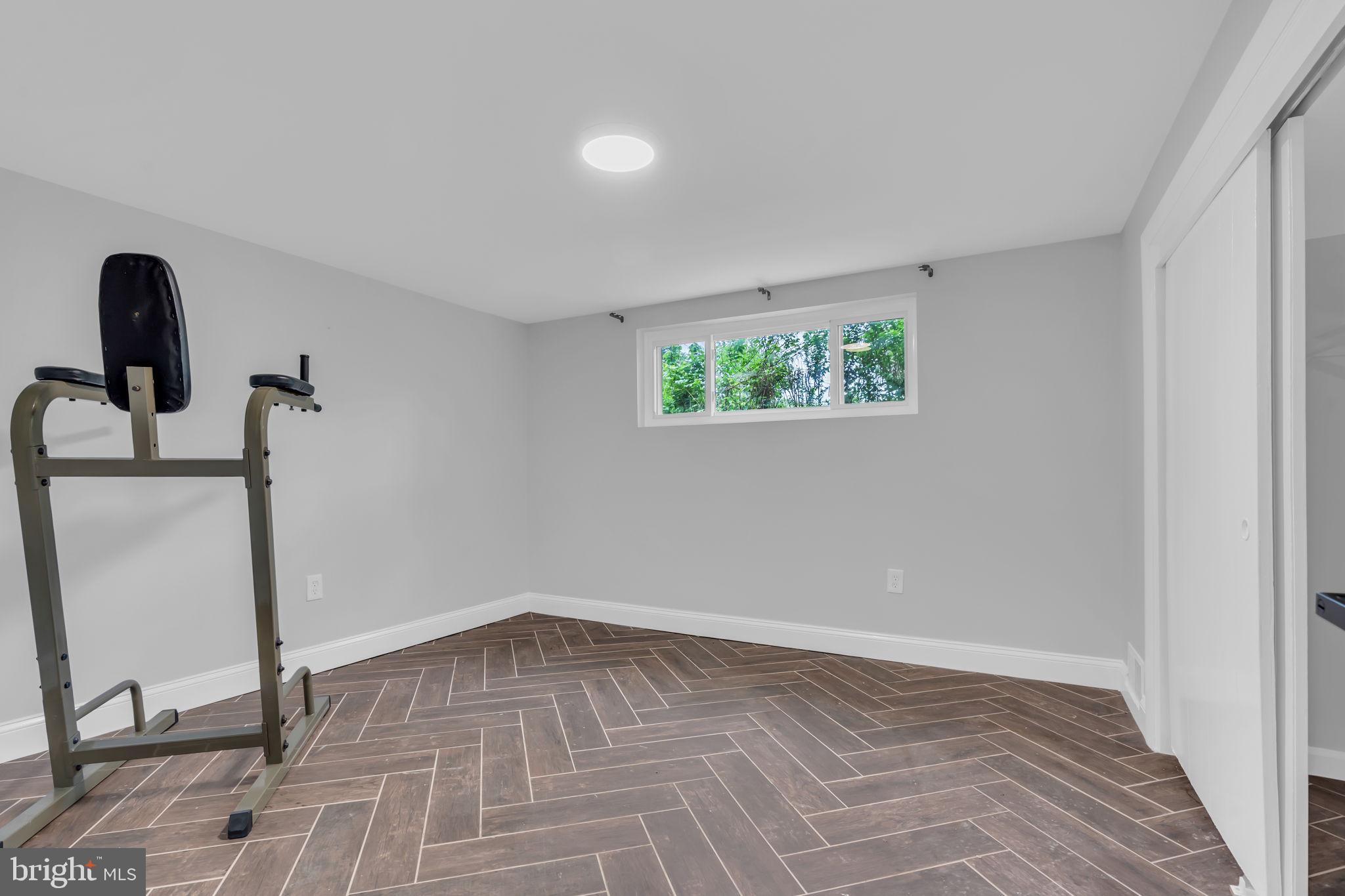 6809 Braddock Road Springfield, VA 22151 - Photo 38 of 60 a view of empty room with window and fan