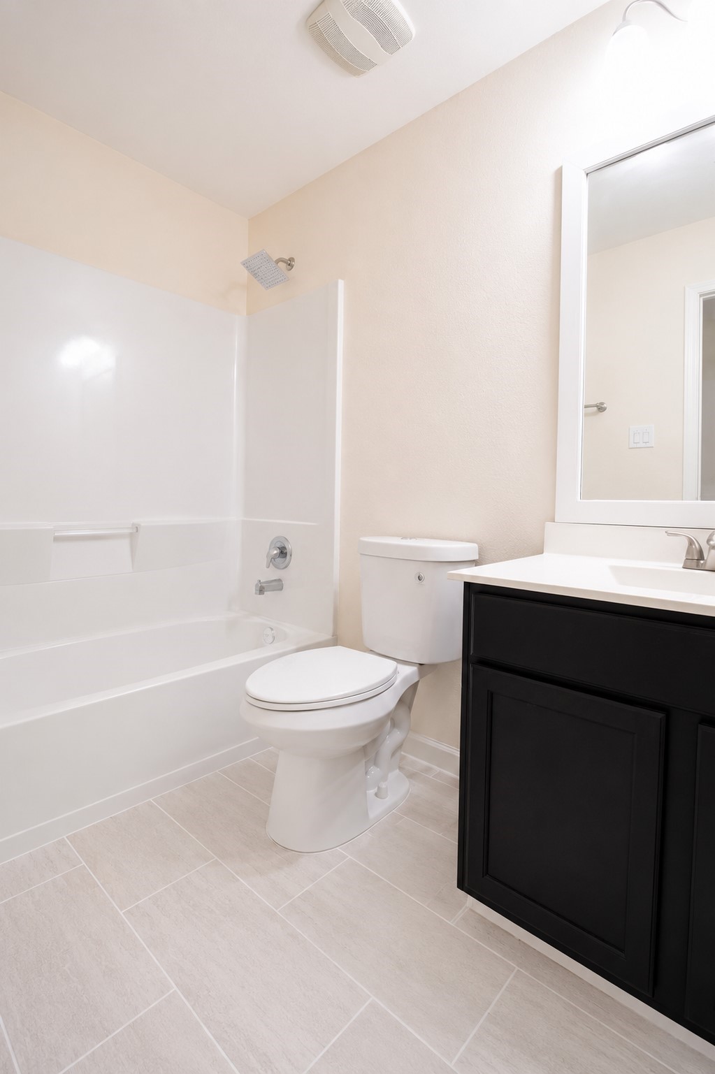 5612 Rainflower Terrace Lane Spring, TX 77389 - Photo 33 of 50 a bathroom with a sink a toilet and a bathtub