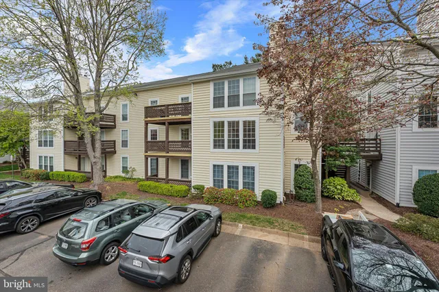 a car parked in front of a house