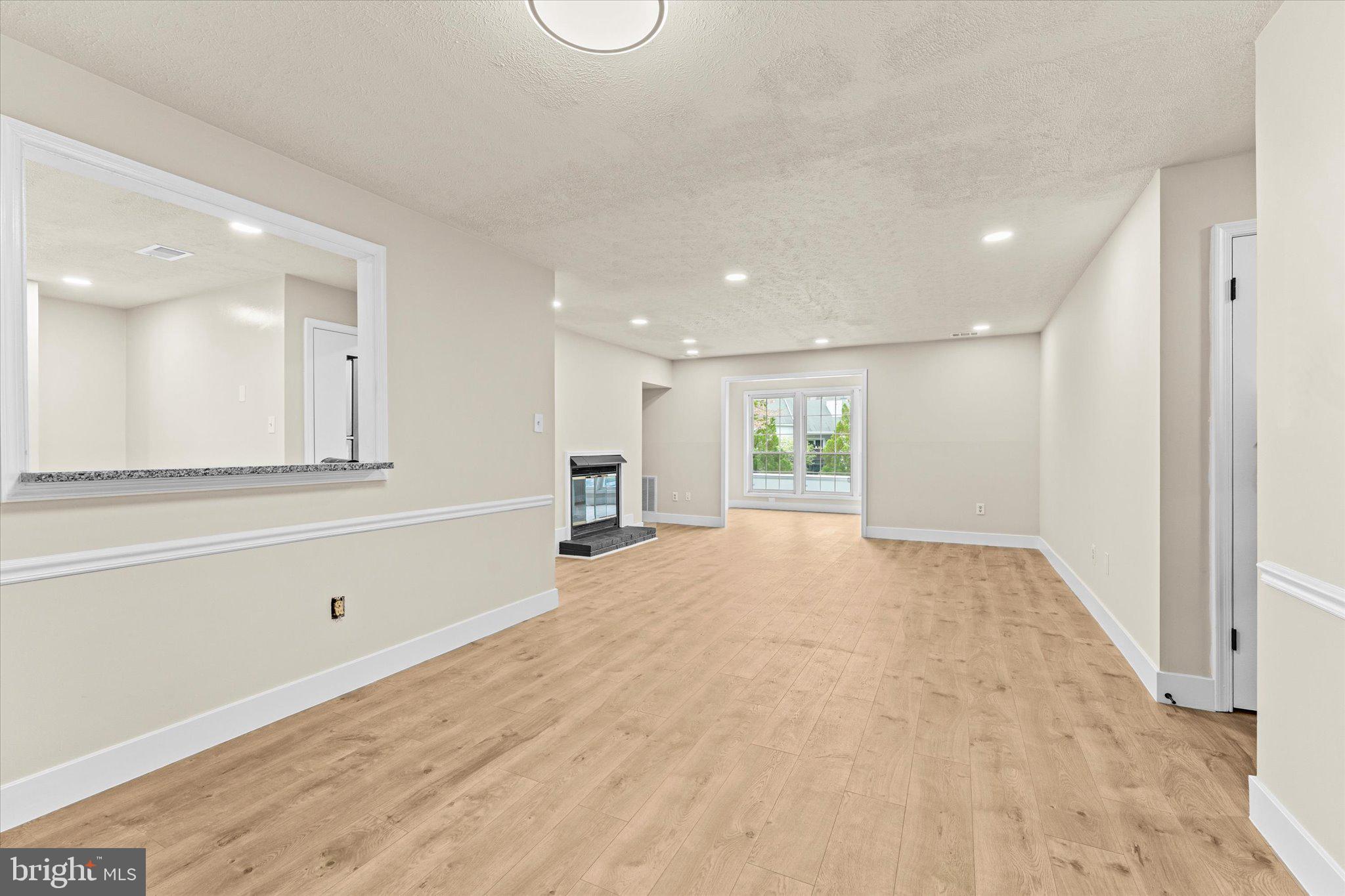 10066 Oakton Terrace Road, Unit 10066 Oakton, VA 22124 - Photo 5 of 27 a view of an empty room with a window
