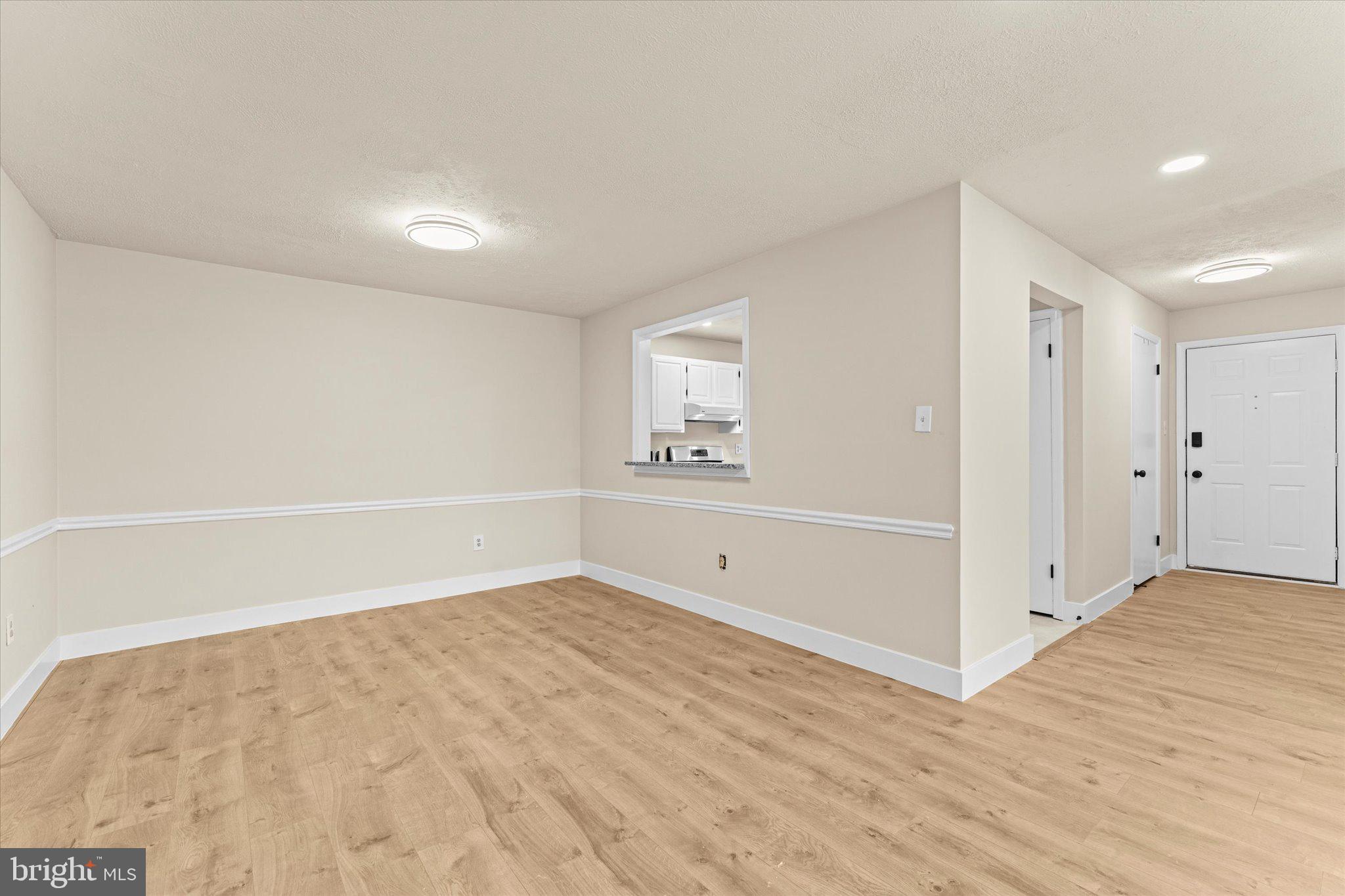 10066 Oakton Terrace Road, Unit 10066 Oakton, VA 22124 - Photo 6 of 27 a view of an empty room