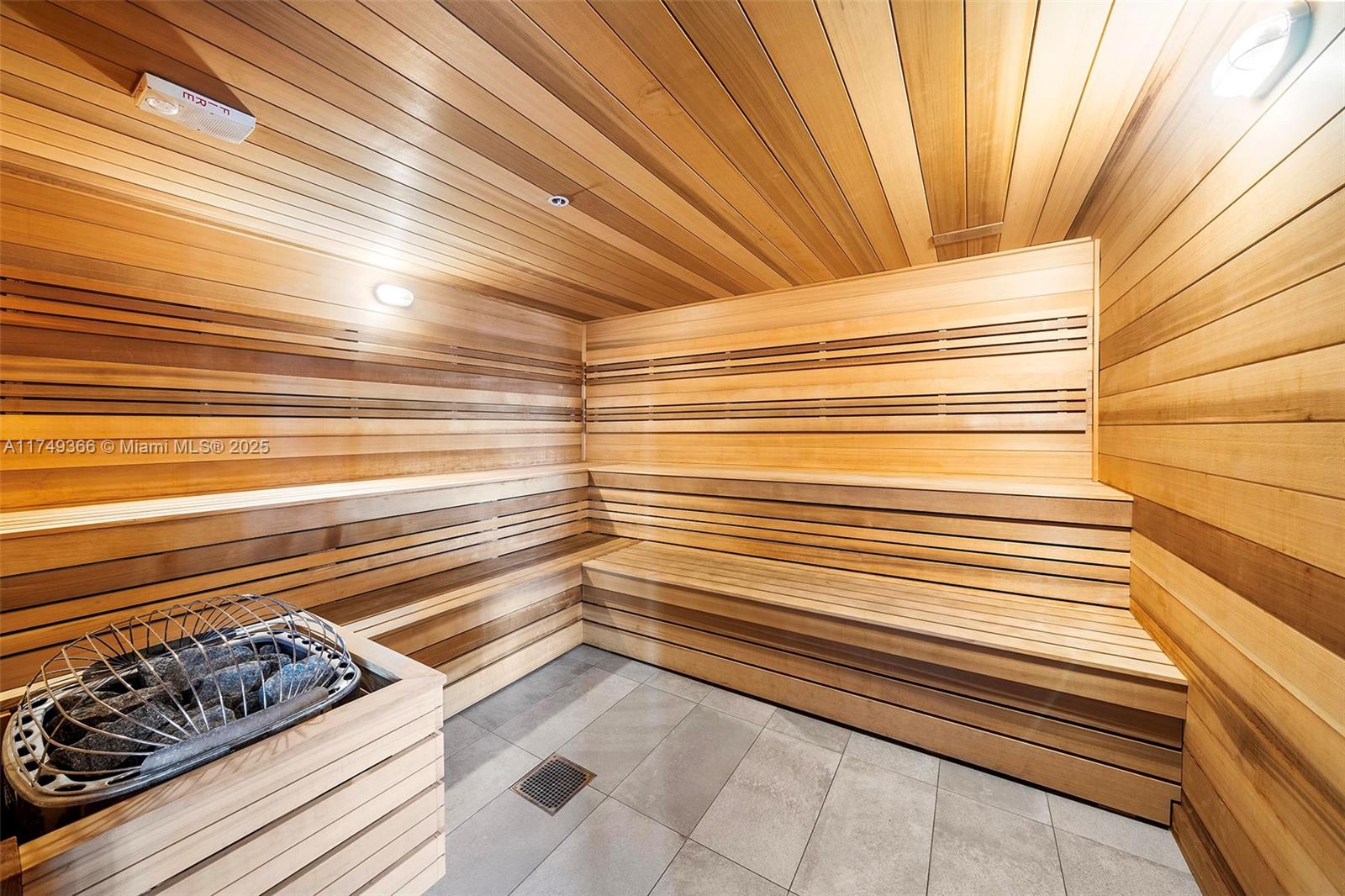 229 Southwest 9th Street, Unit 208 Miami, FL 33130 - Photo 12 of 22 a view of a room with wooden floor and cabinets