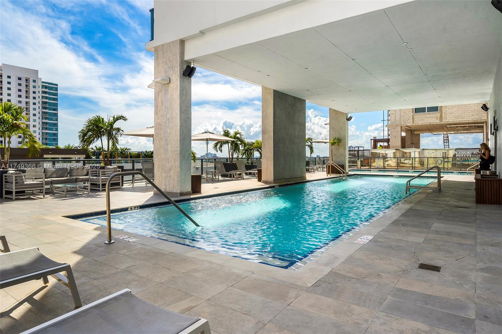229 Southwest 9th Street, Unit 208 Miami, FL 33130 - Photo 16 of 22 a view of a hall way with furniture