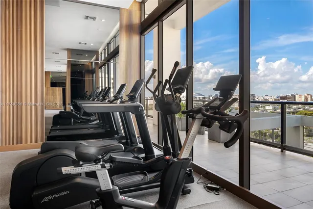 a view of a hallway with an outdoor space