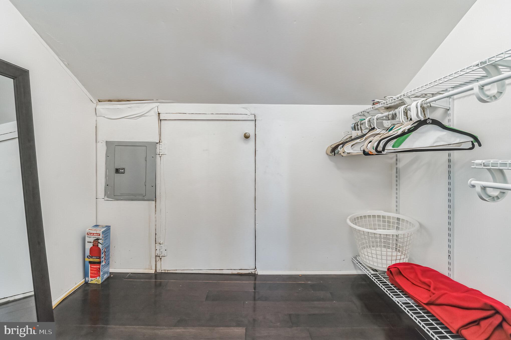 6774 Ridge Avenue, Unit 2 Philadelphia, PA 19128 - Photo 14 of 15 a view of a room with wooden floor and chair