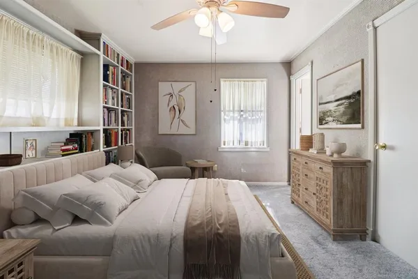 a spacious bedroom with a large bed and a window