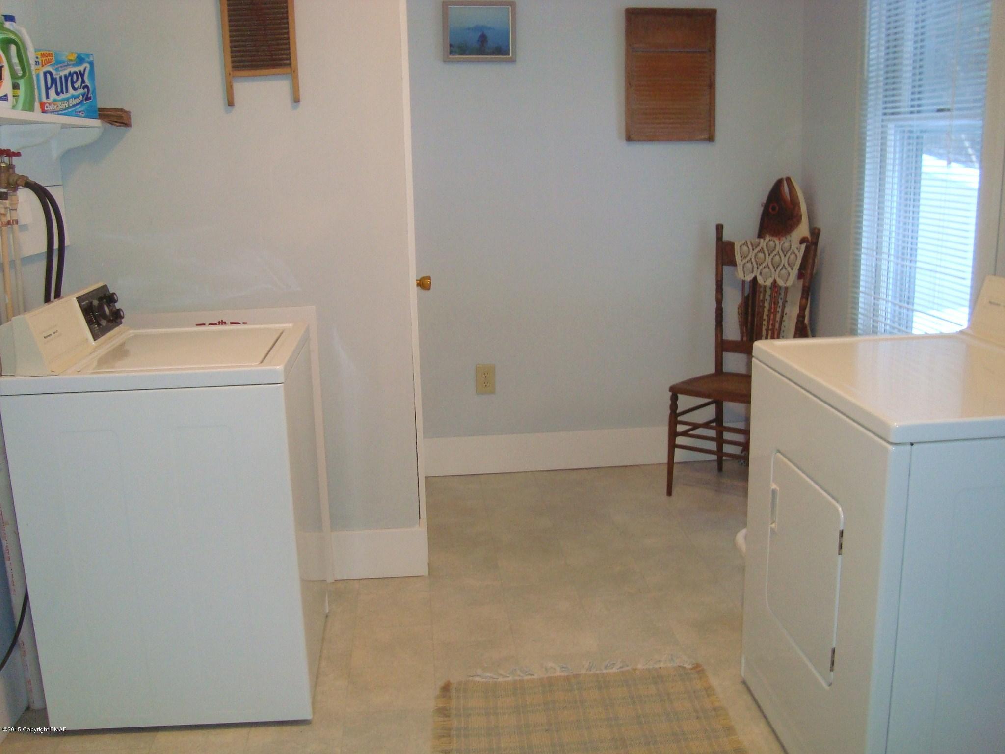 879 Lower Swiftwater Road Cresco, PA 18326 - Photo 36 of 65 a bathroom with a sink a toilet and shower