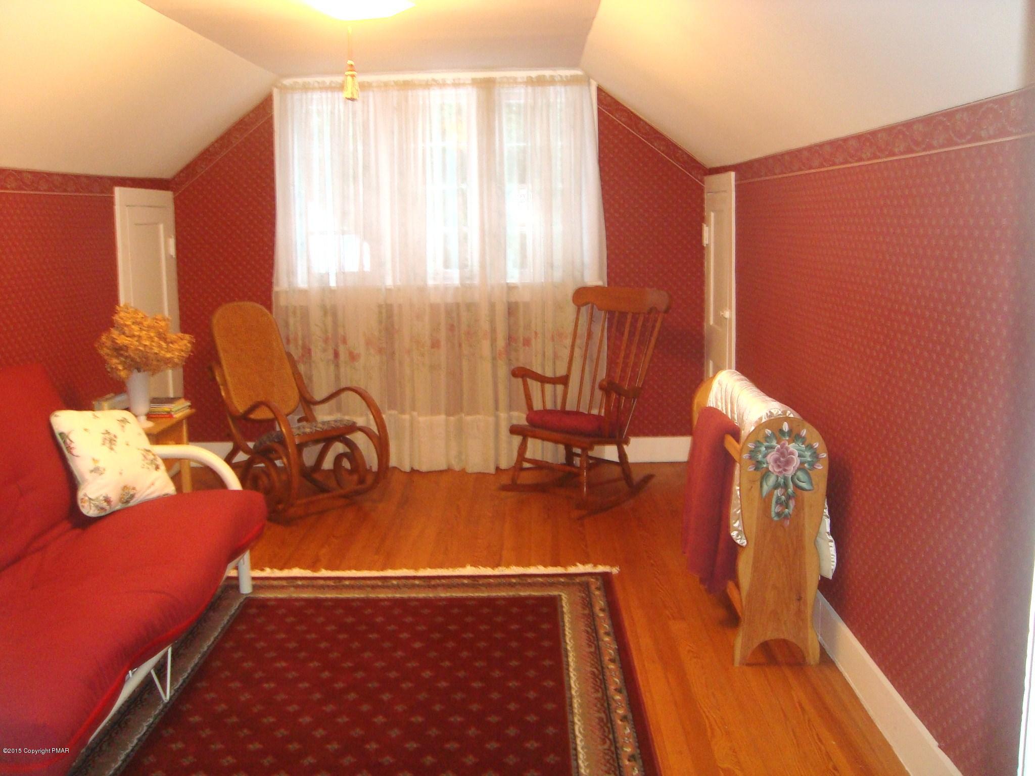 879 Lower Swiftwater Road Cresco, PA 18326 - Photo 44 of 65 a view of a workspace with furniture and a window