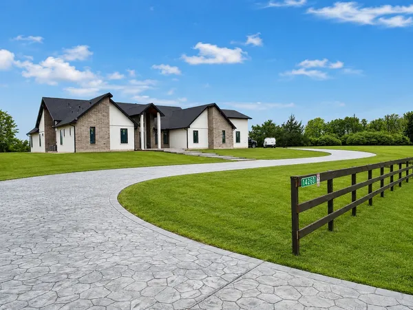 a view of outdoor space yard and front view of a house