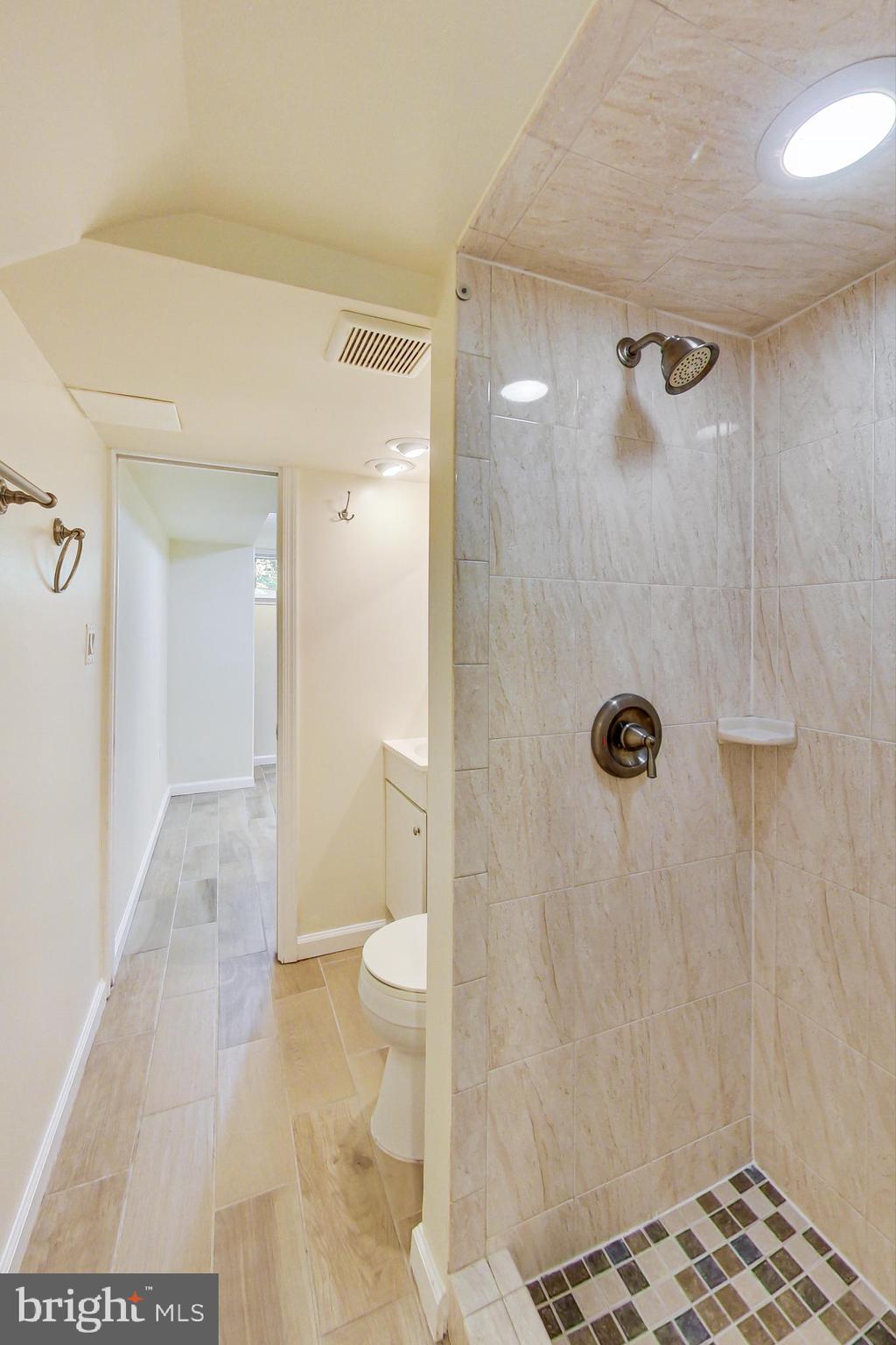 2712 Newton Street Silver Spring, MD 20902 - Photo 35 of 46 Full bathroom with updated tile shower