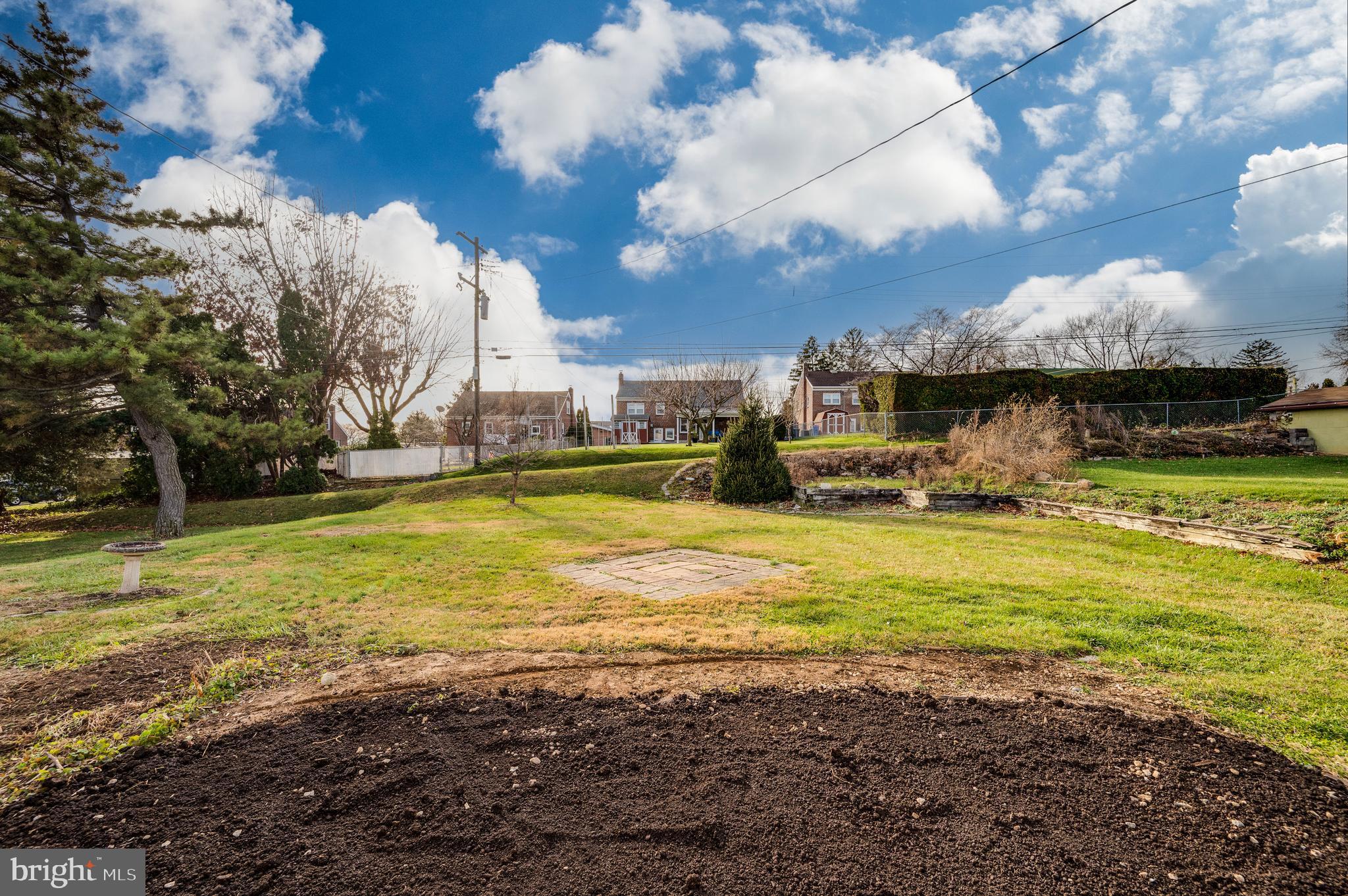 3346 Sheidy Avenue Reading, PA 19605 - Photo 30 of 35 a swimming pool is in a big yard with lawn chairs