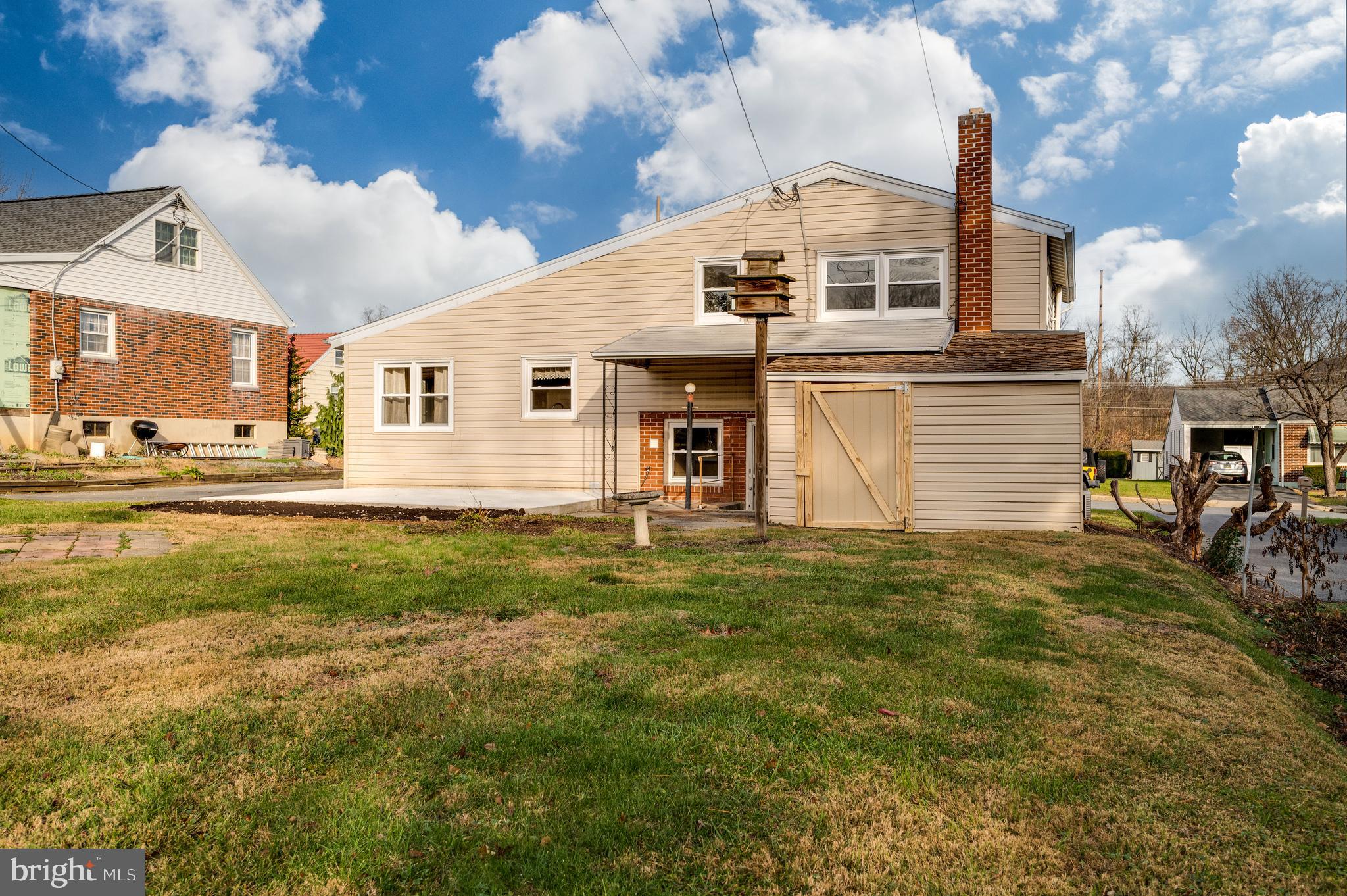 3346 Sheidy Avenue Reading, PA 19605 - Photo 35 of 35 a front view of a house with a garden