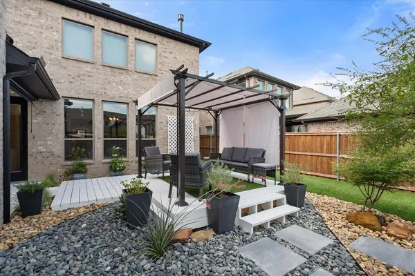 a view of a house with a patio