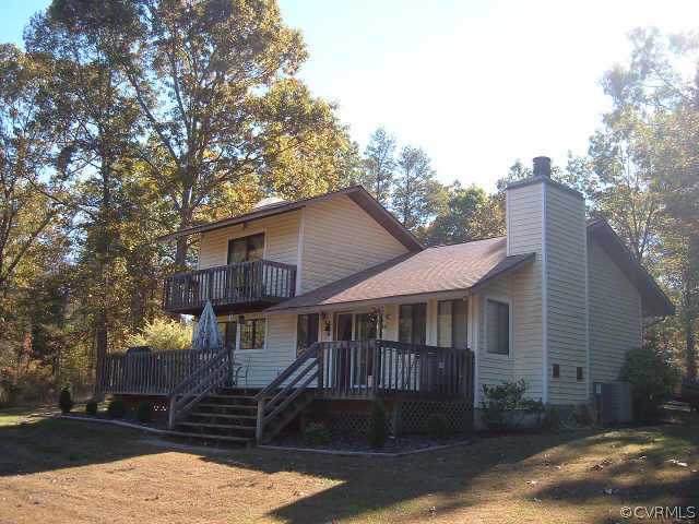 361 Mapleranda Road Bumpass, VA 23024 - Photo 1 of 1 a view of a yard in front of house