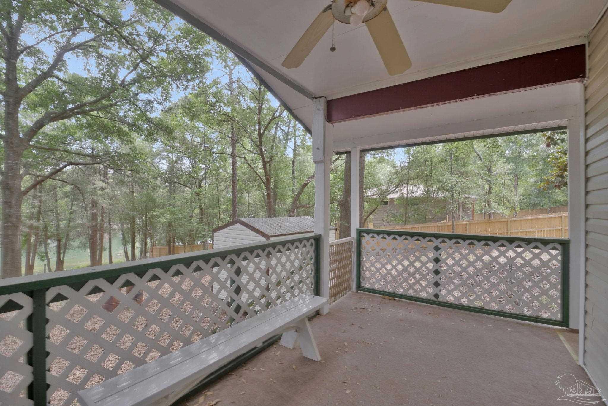 10290 West Lake Road Milton, FL 32583 - Photo 20 of 53 a balcony with outdoor space