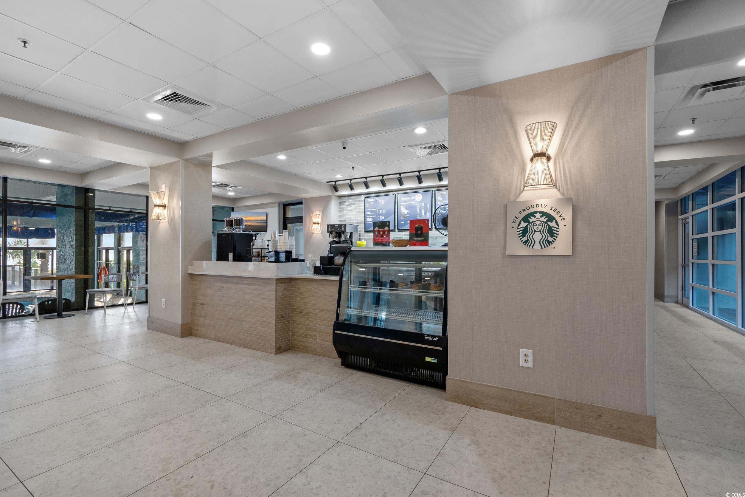 2401 South Ocean Boulevard, Unit 659 Myrtle Beach, SC 29577 - Photo 30 of 38 Reception area with a paneled ceiling