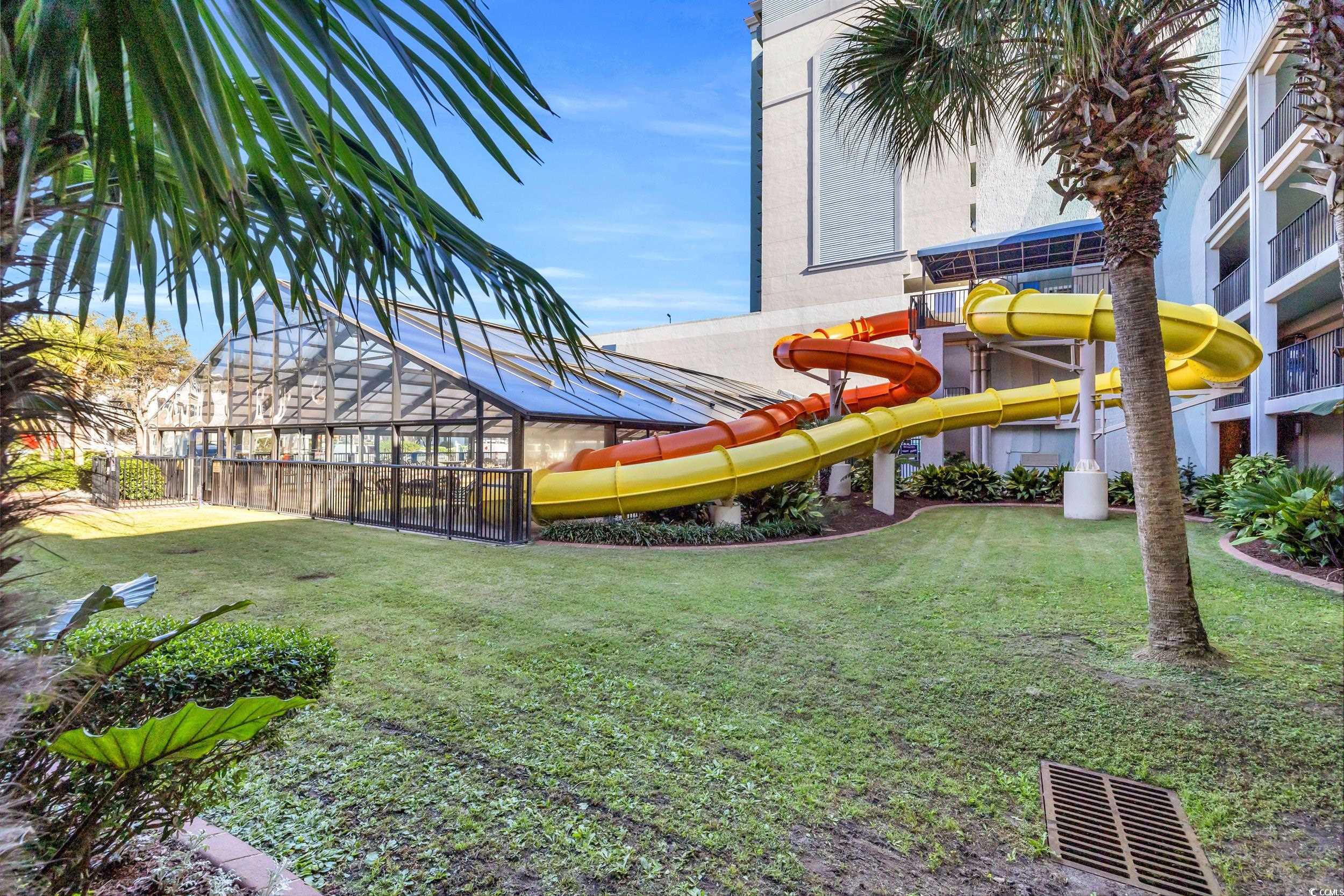 2401 South Ocean Boulevard, Unit 659 Myrtle Beach, SC 29577 - Photo 33 of 38 View of home's community featuring a fenced backyard