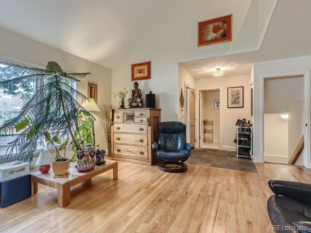 4400 Wellington Road Boulder, CO 80301 - Photo 5 of 32 a living room with furniture and a fireplace