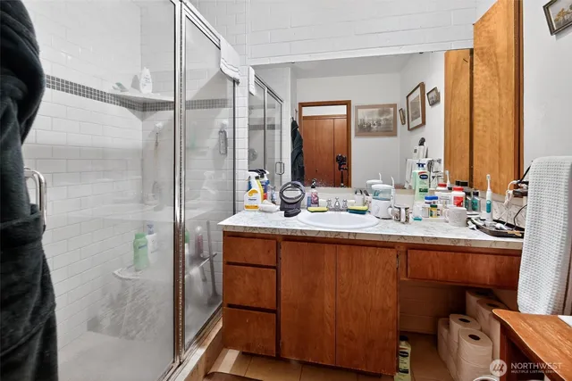 a bathroom with a sink and a mirror