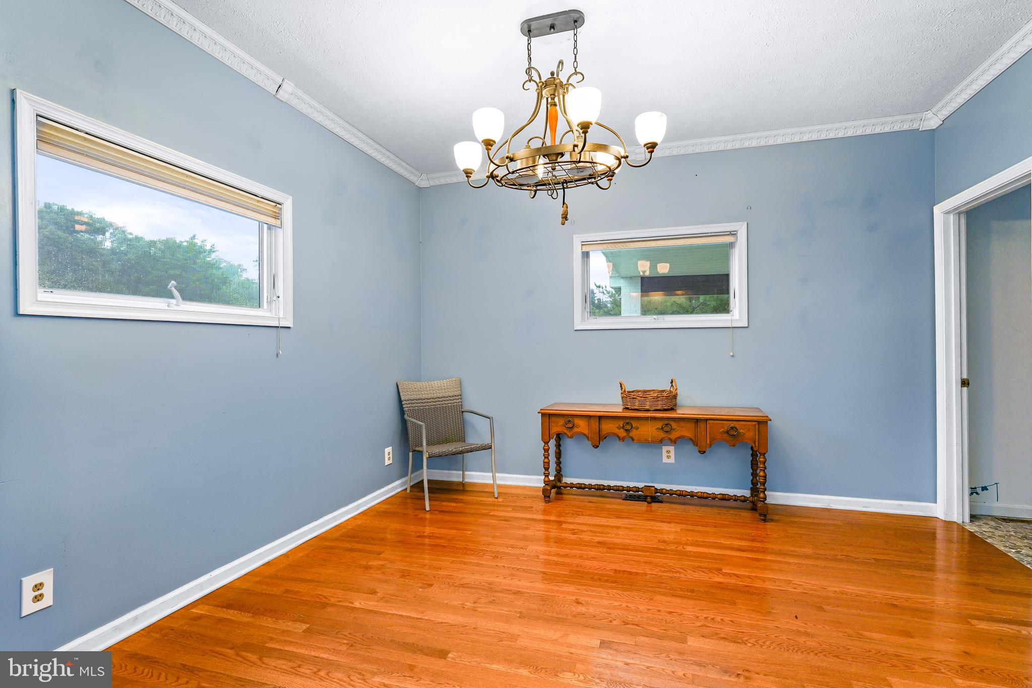 177 Pearce Creek Drive Earleville, MD 21919 - Photo 16 of 37 a room with a chandelier and pool table