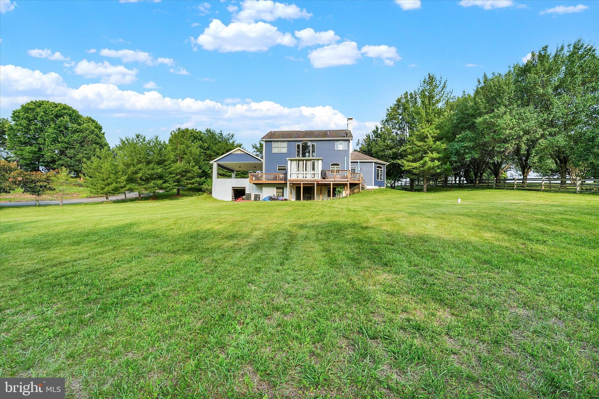 177 Pearce Creek Drive Earleville, MD 21919 - Photo 32 of 37 a view of a house with a big yard and large trees