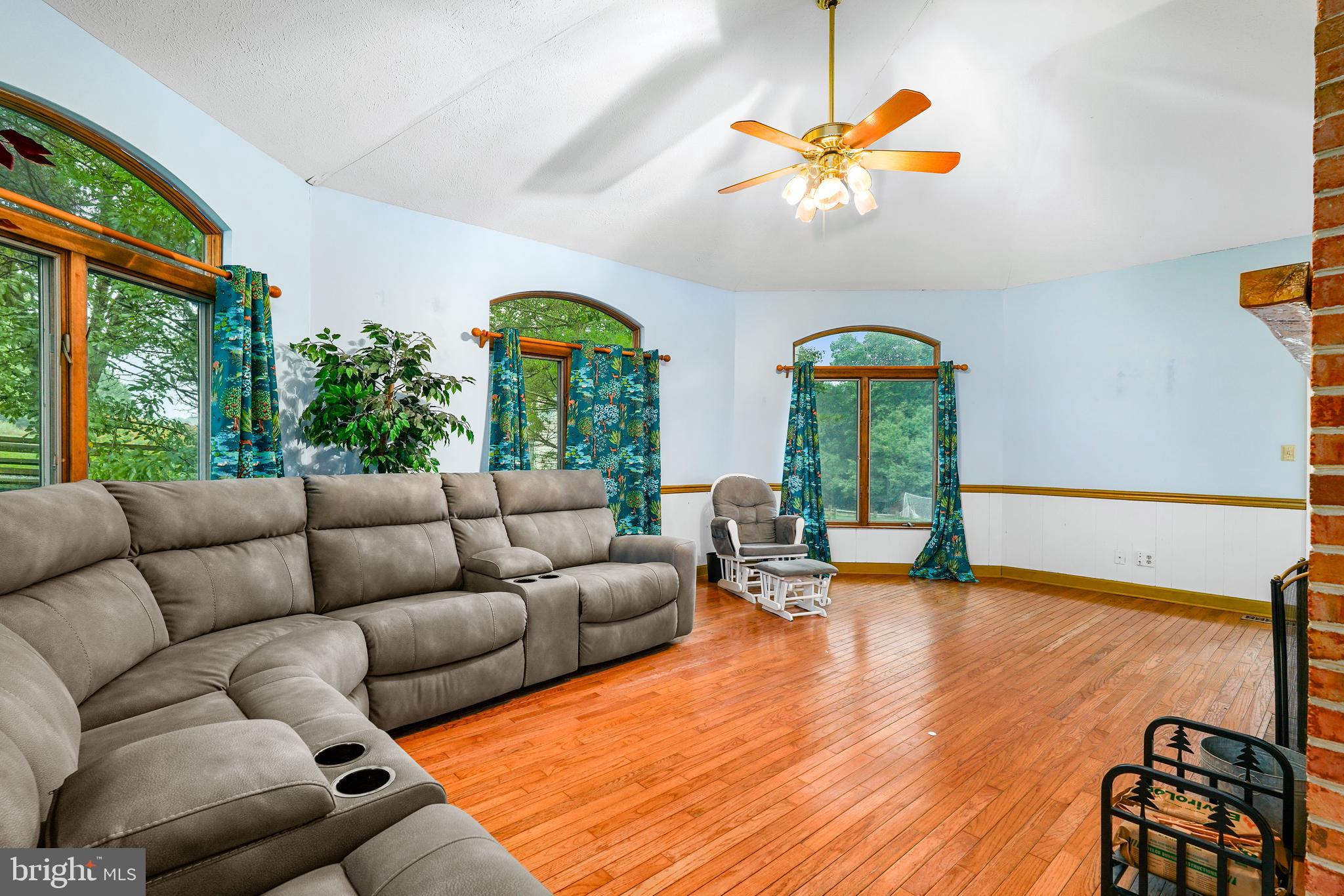 177 Pearce Creek Drive Earleville, MD 21919 - Photo 6 of 37 a living room with furniture garden view and large windows