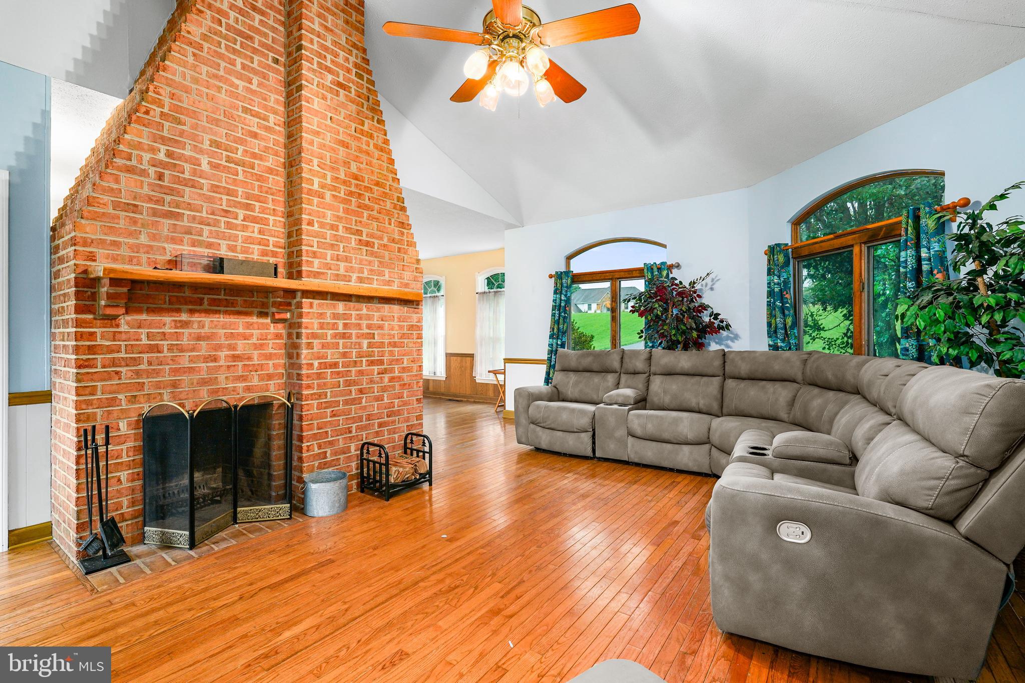 177 Pearce Creek Drive Earleville, MD 21919 - Photo 10 of 37 a living room with furniture and a fireplace