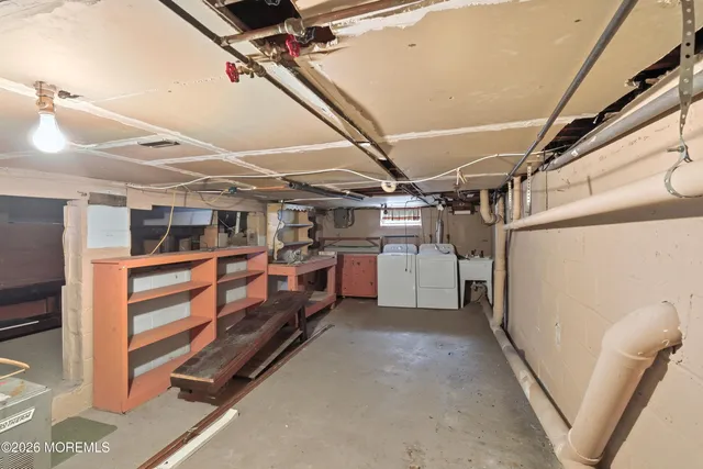 a view of a house with a snow in the forest