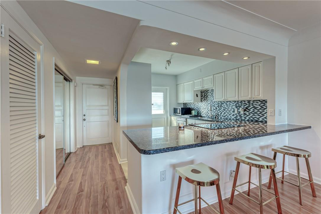 2800 Northeast 30th Avenue, Unit 10D Lighthouse Point, FL 33064 - Photo 16 of 39 Gorgeous Kitchen with Bar