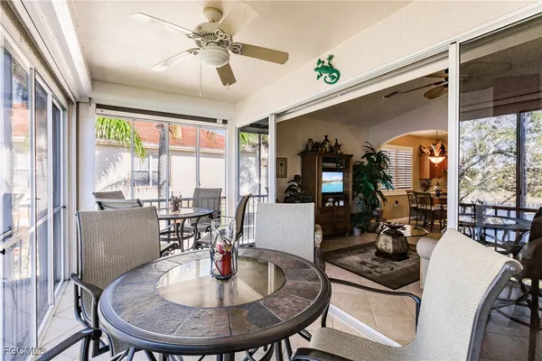 a view of a dining room with furniture window and outside view