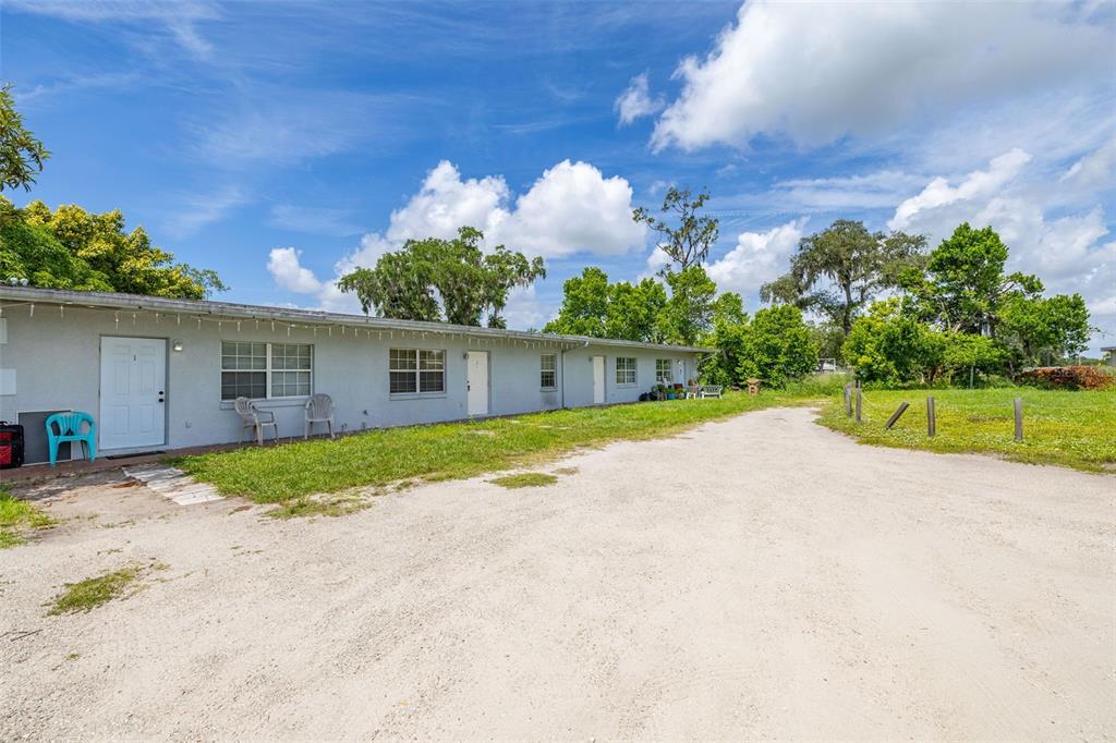 2150 Barbara Drive, Unit 2 St. Cloud, FL 34771 - Photo 5 of 9 a view of a backyard of the house