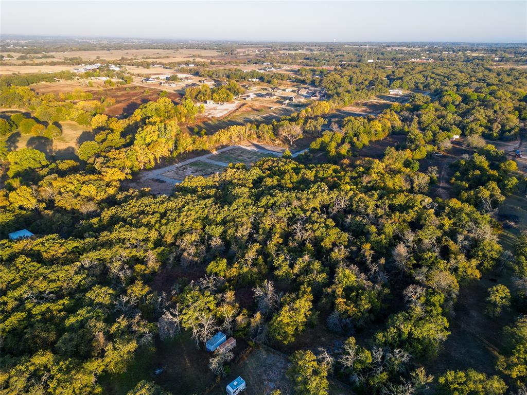 1291 Jay Bird Road Springtown, TX 76082 - Photo 6 of 7 an aerial view of residential building and ocean