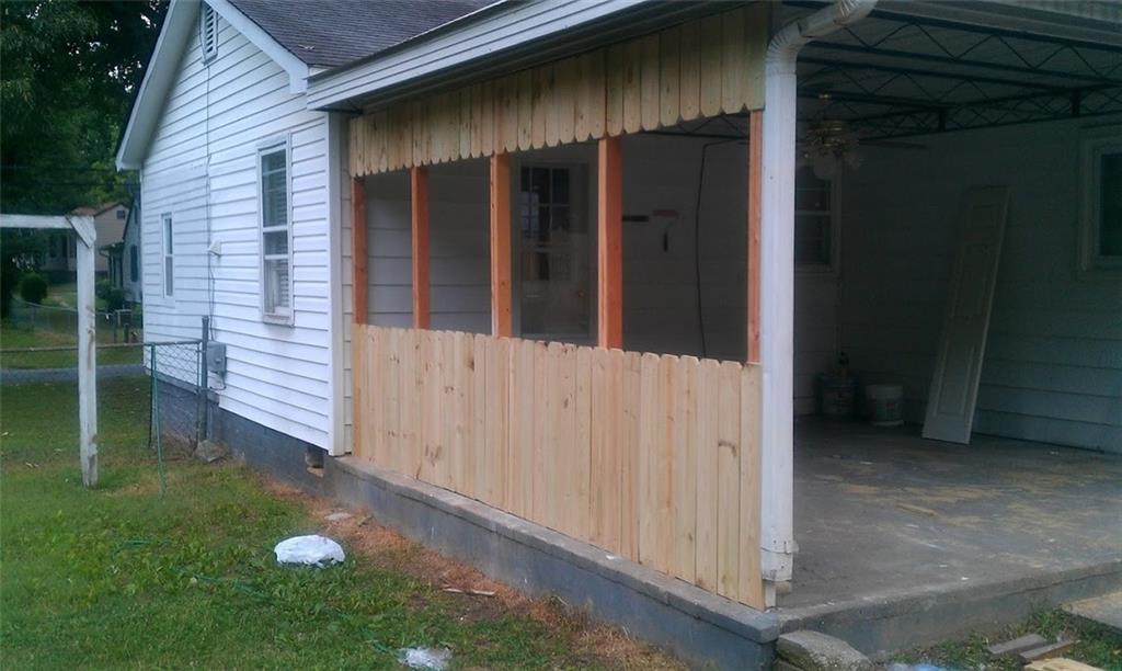 55 Cochran Road Southeast Marietta, GA 30060 - Photo 20 of 20 a view of a small house with yard