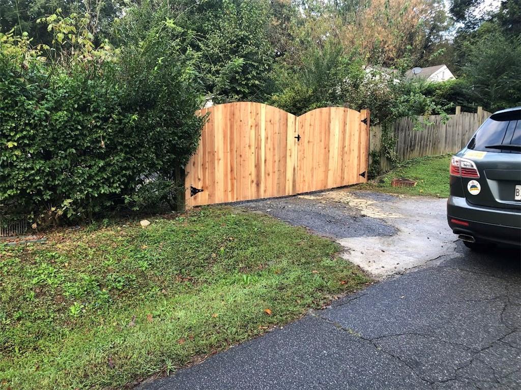 55 Cochran Road Southeast Marietta, GA 30060 - Photo 4 of 20 a view of backyard with small cabin