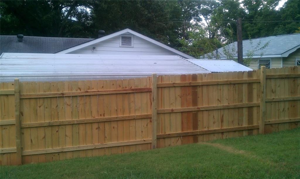 55 Cochran Road Southeast Marietta, GA 30060 - Photo 9 of 20 a backyard of a house with lots of green space