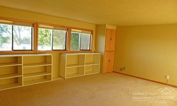13220 Southwest Houston Lake Road Powell Butte, OR 97753 - Photo 19 of 24 Bedroom upstairs with views of the Casca