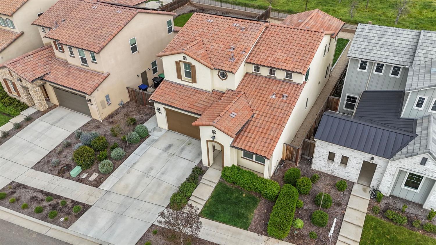 4491 Vineyard Drive Madera, CA 93636 - Photo 39 of 47 front view of a house with a yard
