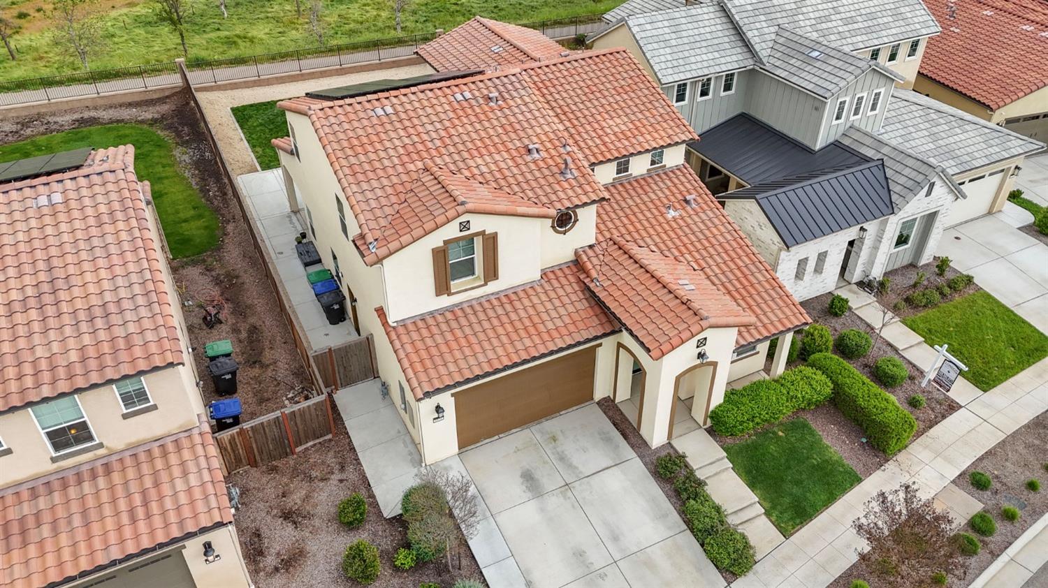 4491 Vineyard Drive Madera, CA 93636 - Photo 40 of 47 an aerial view of a house with a yard