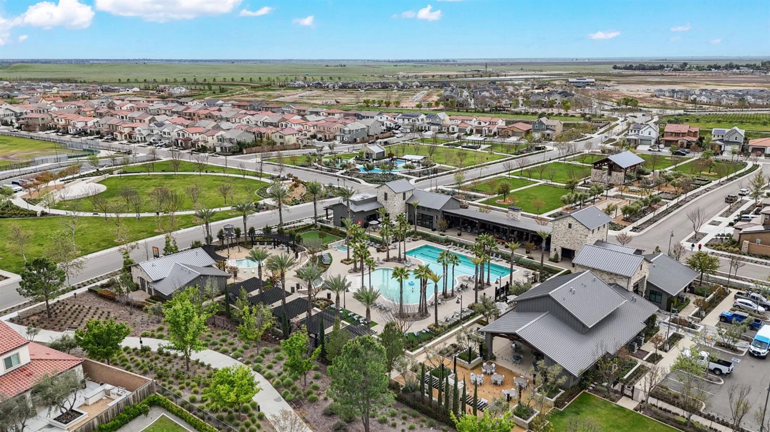 4491 Vineyard Drive Madera, CA 93636 - Photo 46 of 47 an aerial view of residential houses with outdoor space and swimming pool