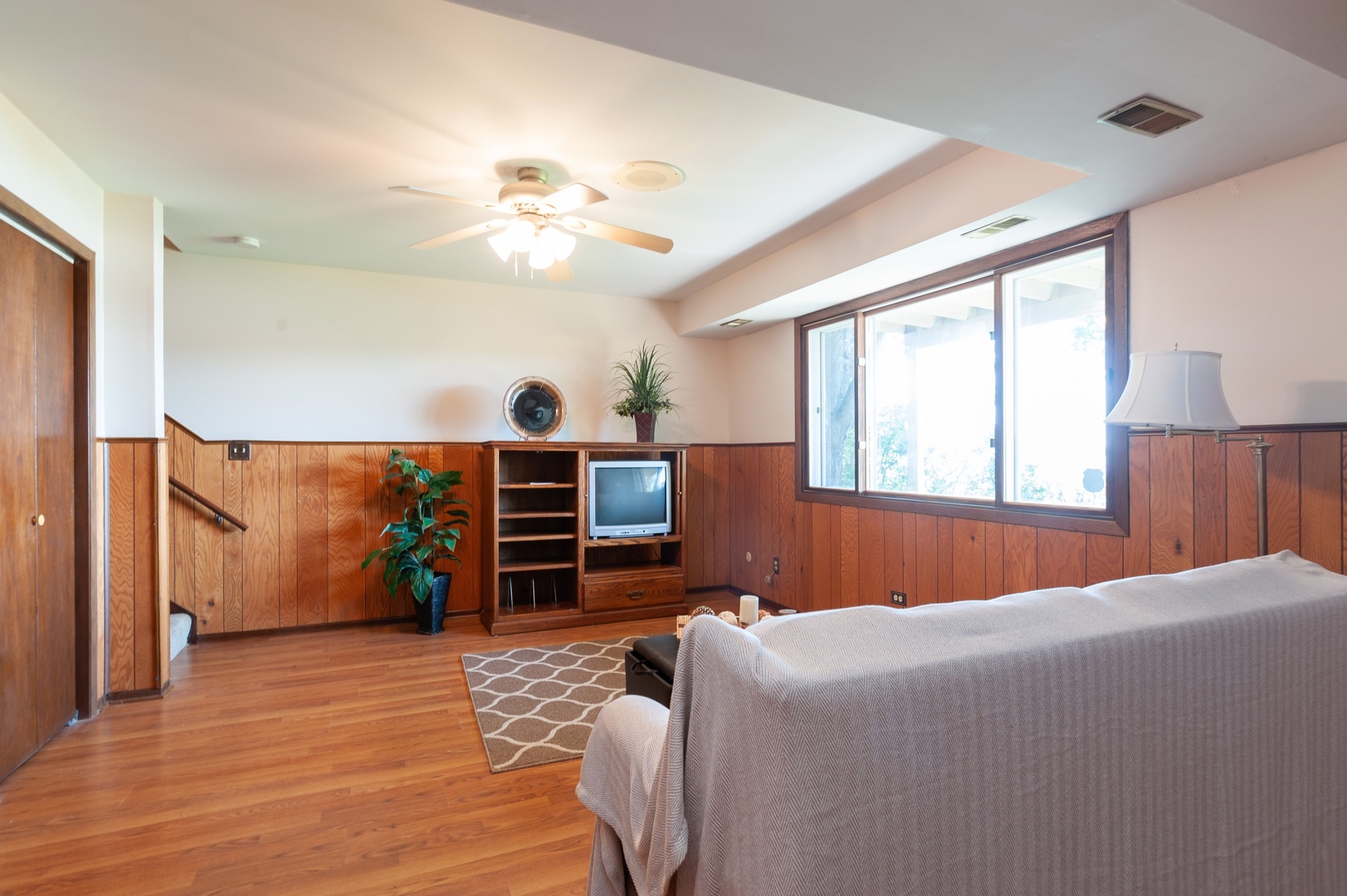 209 North Rushmore Road Fox Lake, IL 60020 - Photo 15 of 21 a bedroom with a bed and wooden floor